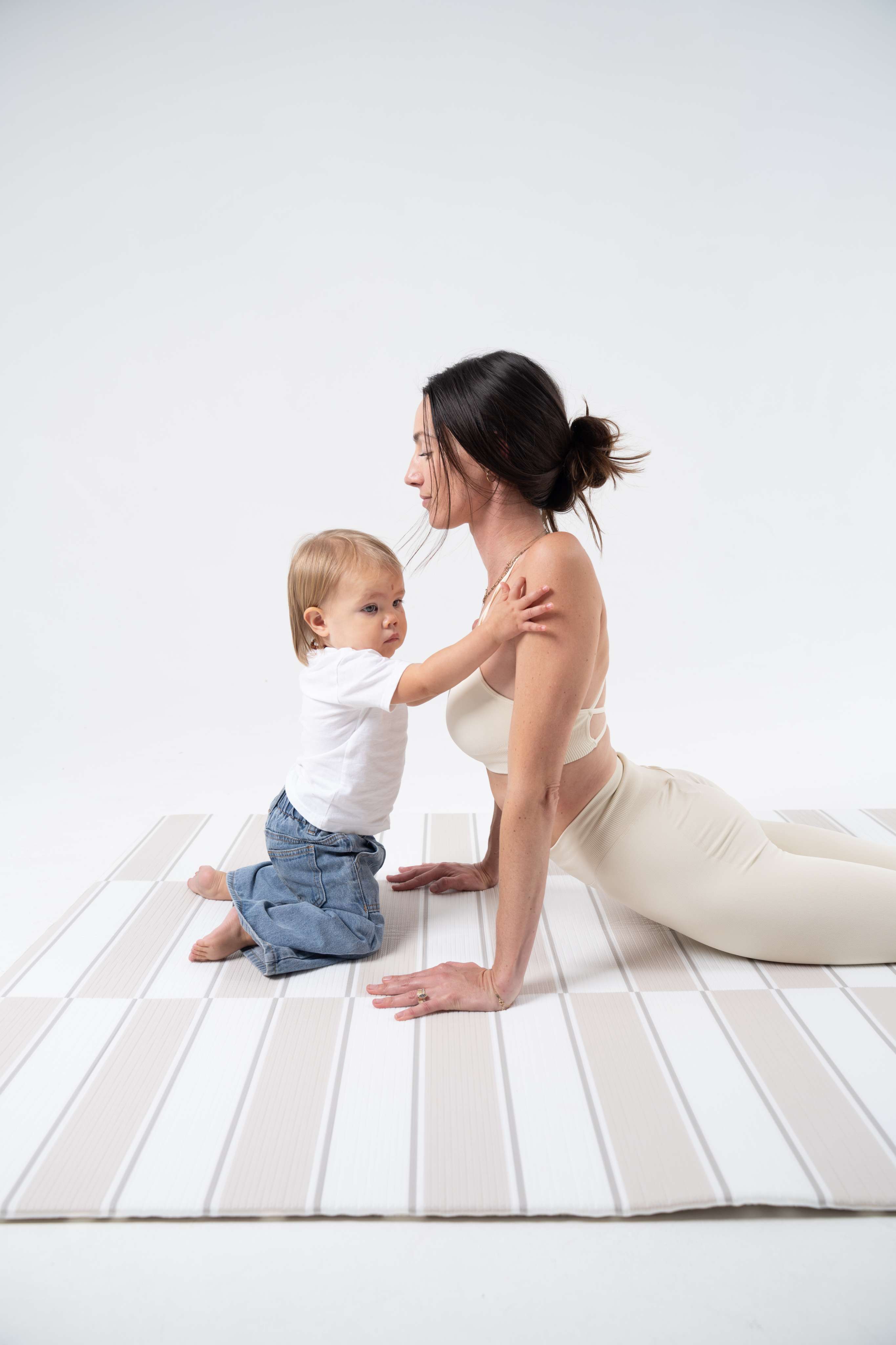 The Postpartum Yoga Mat: Why Your Play Mat Is the One You'll Actually Use