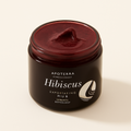 Hibiscus Exfoliating Mud — primary — Clean ecommerce product shot — refreshed editorial photography