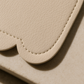 Vegan Leather Changing Mat, Wispy Cream Scallop — primary — Luxury detail / macro — refreshed editorial photography