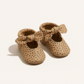 Almond Speckles Knotted Bow Baby Shoe — primary — Clean ecommerce product shot — refreshed editorial photography