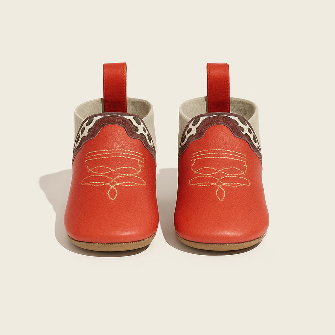 Crimson Cowboy Chelsea Boot Baby Shoe — primary — Clean ecommerce product shot — refreshed editorial photography