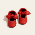 Fire Engine Knotted Bow Baby Shoe — primary — Clean ecommerce product shot — refreshed editorial photography