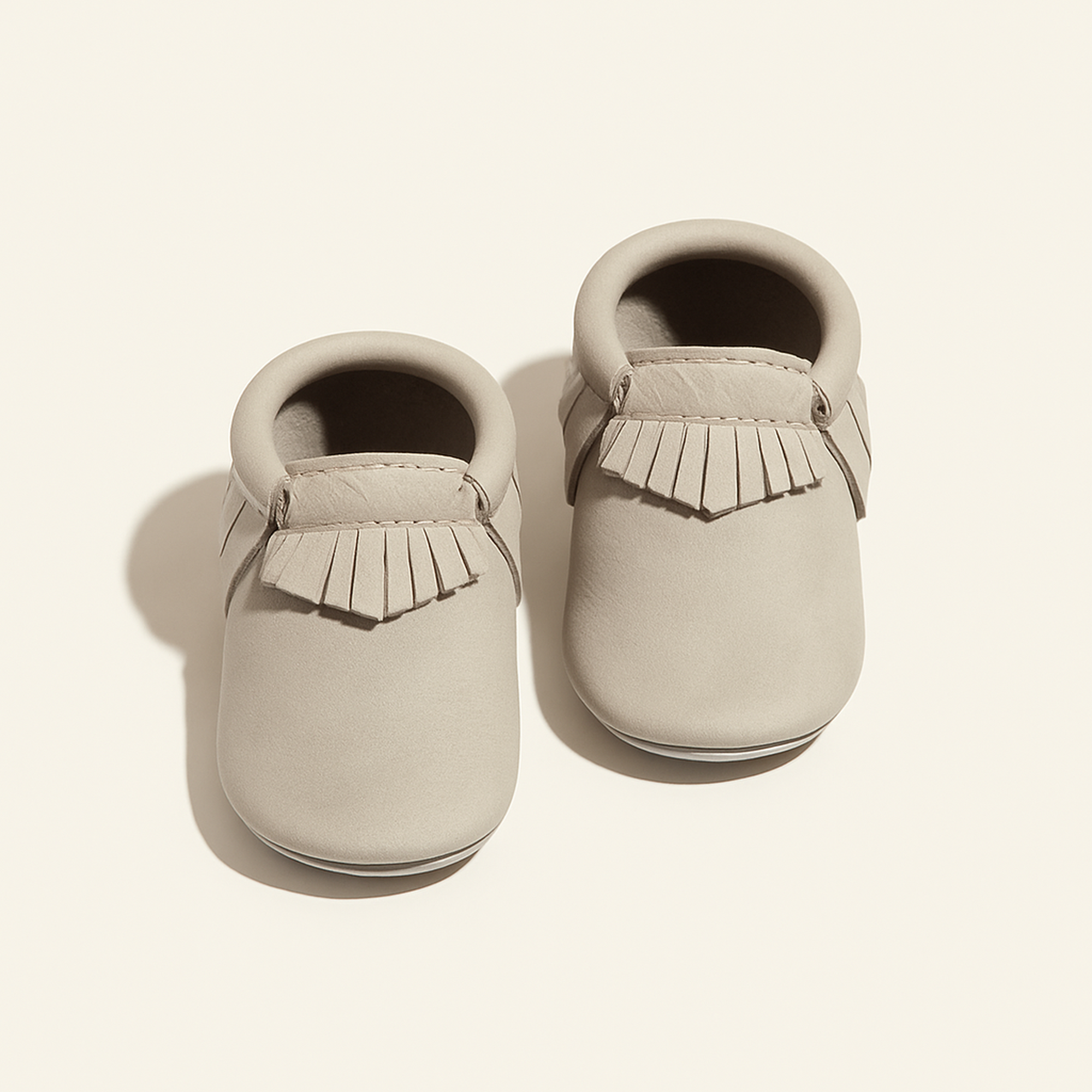 Salt Flats Moccasin Baby Shoe — primary — Clean ecommerce product shot — refreshed editorial photography